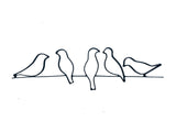 Metal birds on wire wall decor